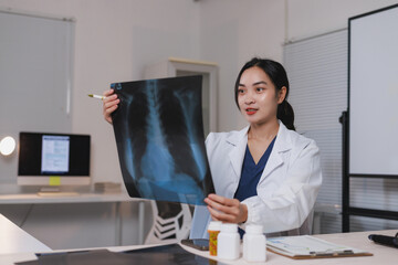Doctor analyzing chest x ray for medical diagnosis