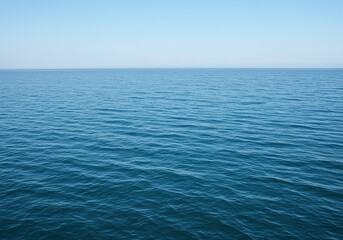 Vast, tranquil saltwater surface shimmering with gentle ripples under natural light. The expansive blue liquid creates a serene and pure natural background ,background ,blue ,climate