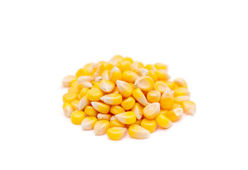 Raw corn grains isolated on white background