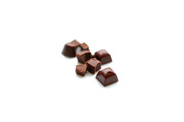 Pieces of tasty chocolate isolated on white