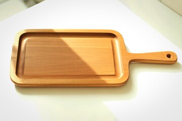 Rectangular wooden serving tray with handle
