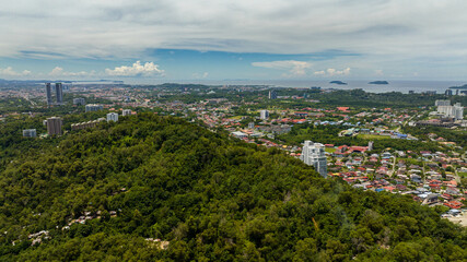 Kota Kinabalu with residential areas, streets and houses view from above. Borneo,Sabah, Malaysia.