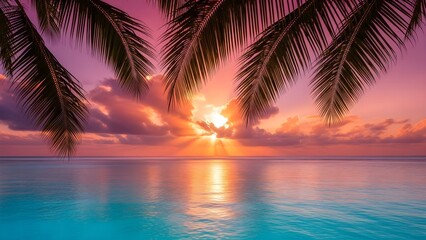 Stunning tropical sunset over ocean with palm trees, vibrant colors and serene seascape.