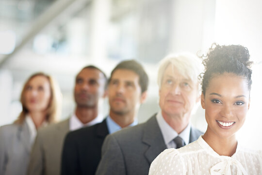 Portrait, business and woman in line, legal team and diversity with confidence. Multiracial, attorney and employees in office, teamwork and smile with leadership, lawyers and unity with solidarity