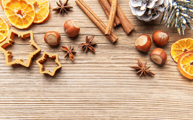 Christmas baking ingredients on rustic wooden background