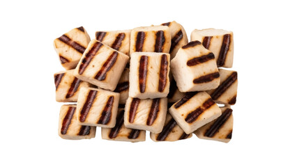 Grilled chicken cubes isolated PNG, delicious and healthy protein source with grill marks on transparent background for food photography