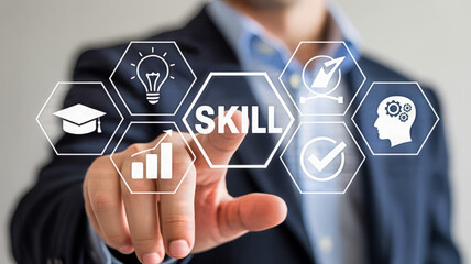 Man touching screen with skill icons for learning and development