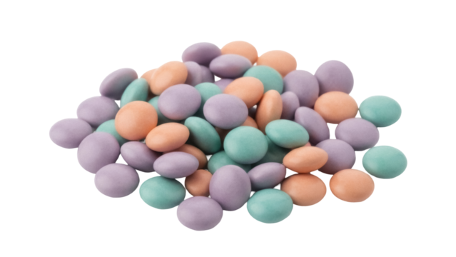 Pastel candy coated chocolate lentils isolated PNG, pile of colorful sweets on transparent background for confectionery and dessert designs