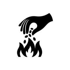 A hand sowing seeds into flames of rebirth black minimalist graphic