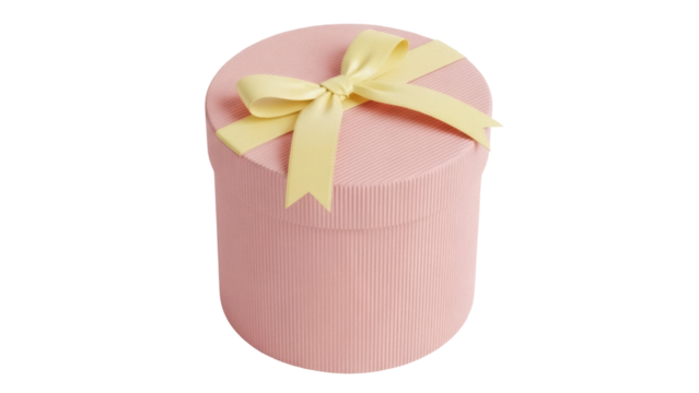 Pink round gift box with yellow ribbon isolated PNG, present container for birthdays and special occasions on transparent background