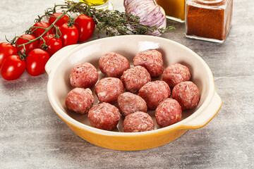 Uncooked raw beef meatball minced