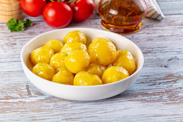 Boiled young potato with oil