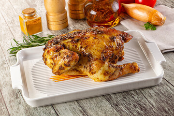 Baked in oven whole chicken with spices