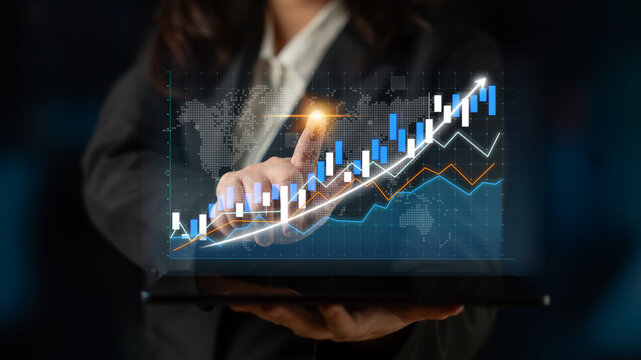 A business professional presents financial data trends on a digital tablet, featuring graphs and charts that highlight growth in various sectors, ideal for corporate themes. Impute