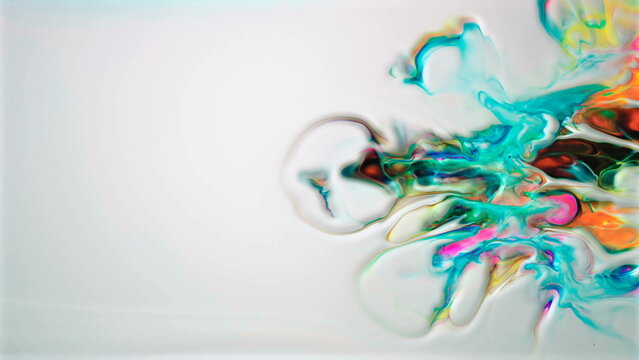 Vibrant flowing paint colors creating an abstract wavy artistic design