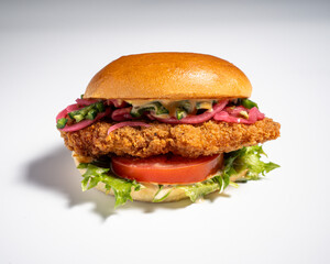 delicious chicken burger with salad on a white background