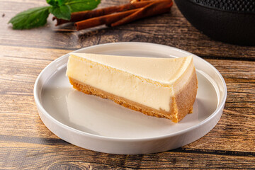 Classic delicous cheesecake slice served mint