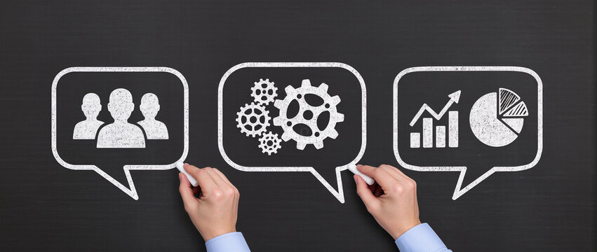 Concept image of business communication at meeting, Businessmen drawing speech balloons on chalkboard