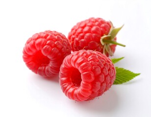 Three vibrant, ripe berries on a reflective surface, showcasing intricate textures and vibrant colors. Close-up details