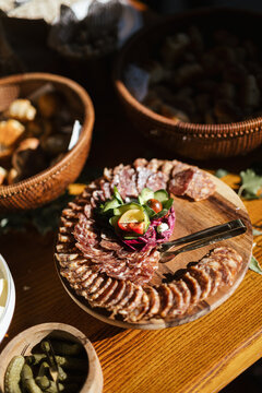delicious salami on wooden board 