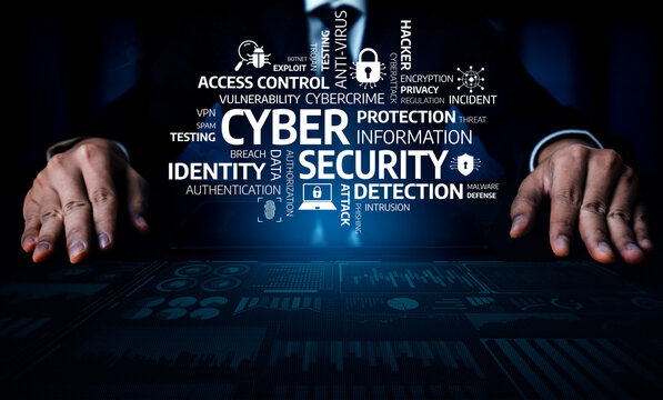 A business professional hands rest on a table filled with cyber security concepts, highlighting the importance of protection, detection, and prevention of digital threats. Tessel