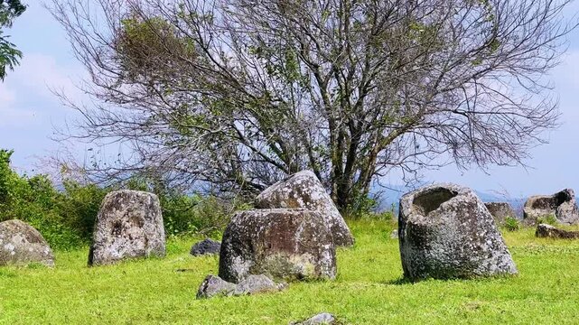 Valley of the Jars, Laos. Phongsavan. Valley of the Jars. The megalithic archaeological landscape consists of thousands of stone jars scattered across the Xiangkhouang Plateau. 4К
