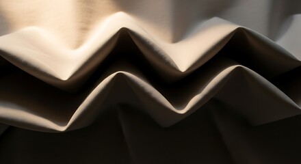 The subtle beauty of accordion folds on a neutral colored textile surface