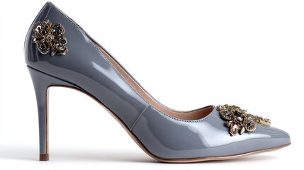 A stylish grey patent leather pump with decorative embellishments is presented on a white background.