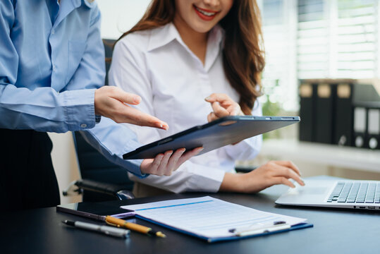 Team work process. Photo young business crew working with new startup project. Project managers meeting. Analyze plans, papers in office