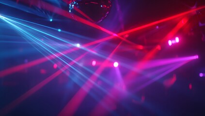 Vibrant red and blue laser beams intersecting in a dark atmosphere creating a dynamic light show experience