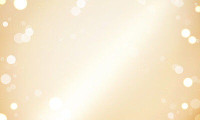 光と玉ボケが散りばめられたシャンパンゴールドの背景