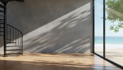 Empty modern room with a spiral staircase and a large window overlooking a sunny beach.