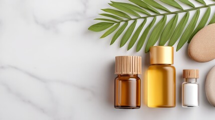 Wellness Morning Flatlay Essentials, Elegant arrangement of essential oil bottles and stones with greenery.