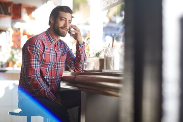 Man, talking or cafe with phone call for communication, chat or network connection in restaurant. Male person, customer or listening on mobile smartphone for conversation or discussion in coffee shop