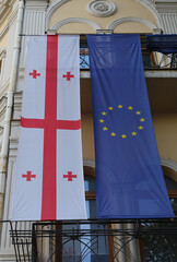 Old Building with Georgian and EU flag hanging in Tbilisi, Georgia