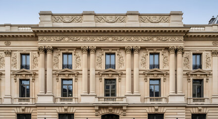 Obraz premium Historic architectural masterpiece featuring a classic building façade adorned with intricate ornamentation and graceful windows set against a softly lit sky