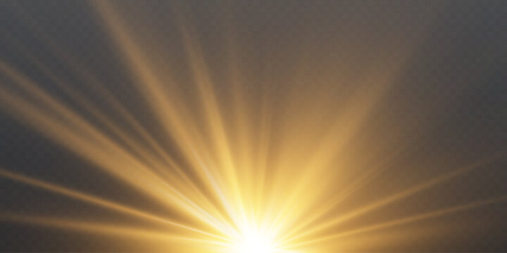 Golden light rays shining down on dark background