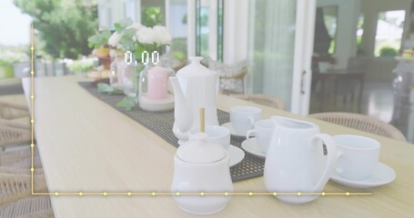 Displaying white ceramic tea set resting on porch table, with runner and yellow graph overlay © vectorfusionart