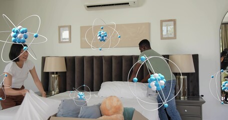 Making man green-shirt woman white-top arranging bed in bedroom, with teddy and blue overlays