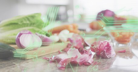 Sitting halved red onion and papery skins crowding stone countertop in kitchen, AR overlay