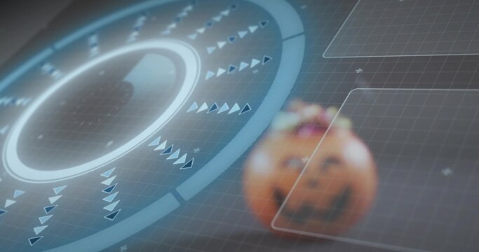 Showing circular HUD glowing with rings and spinning arrows in virtual grid with carved pumpkin