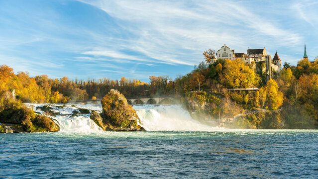 Autumn landscape of Rhine Falls and Schloss Laufen. Neuhausen am Rheinfall, Schaffhausen, Switzerland.