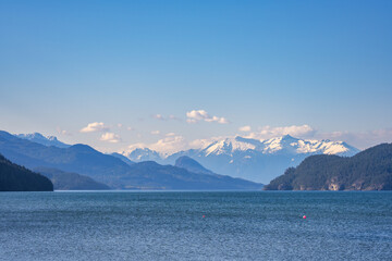 Harrison Lake water views with snow capped mountains