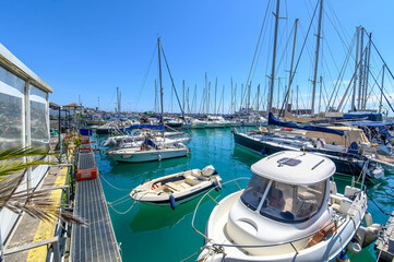 Catania, Sicily, Italy. Luxury yachts and sailboats moored at the pier in Catania harbor