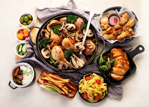 Family dinner. Roasted chicken with vegetables. Healthy eating. - Powered by Adobe