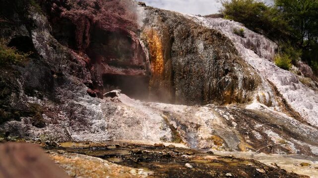 Colorful geothermal rock waterfall New Zealand