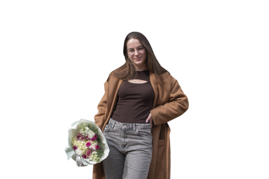 A young woman in a brown coat holding a bouquet of a flowers isolated