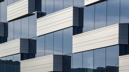 Modern geometric architecture with glass and metal facade design