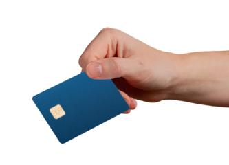 A hand holding a blue bank card with an embedded chip against a clean background..