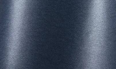 Dark blue paper background with a smooth, glossy texture and metallic shimmer. Cool, rich tones